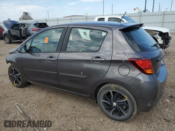 2015 Toyota Yaris L with VIN VNKKTUD36FA054117, listed as a Copart auction lot 65542094 with 66,117 mi miles and Salvage Title. Bid and sale history available at carsss.com. Image 2.