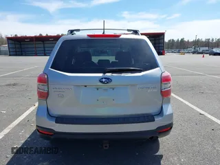 2014 Subaru Forester 2.5i Premium with VIN JF2SJAECXEH494196, listed as a IAAI auction lot 42097228 with 119,448 mi miles. Bid and sale history available at carsss.com. Image 16.