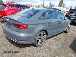 2017 Audi A3 Premium z VIN WAUAUGFF6H1044150, wystawiony jako IAAI lot #42002615 z przebiegiem 60 371 mil mil oraz . Historia ofert i sprzedaży dostępna na DreamBid. Obrazek 4.