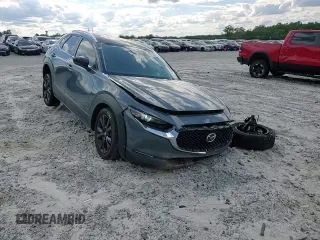 2023 Mazda CX-30 S Carbon Edition с VIN 3MVDMBCM9PM517237, выставлен на аукционе Copart как лот 55773945 с пробегом 17 724 миль миль и Списание • Salvage title. История ставок и продаж доступна на DreamBid. Изображение 14.