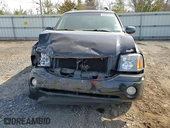 2003 GMC Envoy SLT z VIN 1GKET16PX36243554, wystawiony jako Copart lot #49083975 z przebiegiem 148 596 mil mil oraz Szkoda całkowita • Salvage title. Historia ofert i sprzedaży dostępna na DreamBid. Obrazek 11.