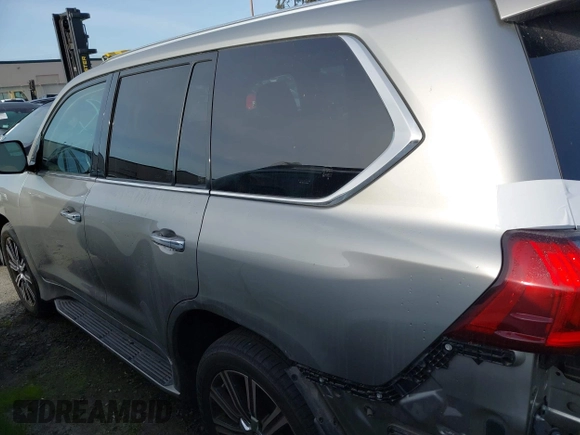 2021 Lexus LX 570 z VIN JTJDY7AX9M4335171, wystawiony jako IAAI lot #41754348 z przebiegiem 32 119 mil mil oraz . Historia ofert i sprzedaży dostępna na DreamBid. Obrazek 14.