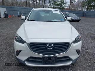 2018 Mazda CX-3 Touring with VIN JM1DKFC71J0315074, listed as a IAAI auction lot 42029790 with 100,268 mi miles. Bid and sale history available at carsss.com. Image 12.