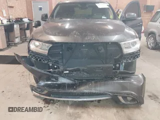 2017 Dodge Durango SXT with VIN 1C4RDJAG7HC606497, listed as a IAAI auction lot 41557479 with 140,151 mi miles and . Bid and sale history available at DreamBid. Image 6.