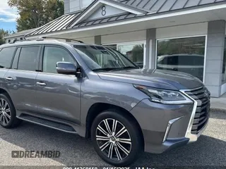 2020 Lexus LX with VIN JTJDY7AX0L4313221, listed as a IAAI auction lot 41368150 with 127,142 mi miles. Bid and sale history available at carsss.com. Image 1.