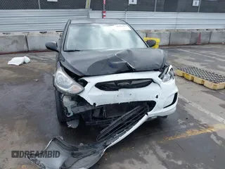 2013 Hyundai Accent GL with VIN KMHCT5AEXDU092644, listed as a IAAI auction lot 42078339 with 134,288 mi miles. Bid and sale history available at carsss.com. Image 6.