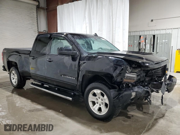 2017 Chevrolet Silverado 1500 LT with VIN 1GCVKREC0HZ141018, listed as a Copart auction lot 52708255 with 96,790 mi miles and Salvage Title. Bid and sale history available at DreamBid. Image 4.