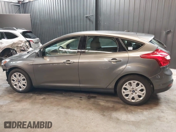 2012 Ford Focus SE with VIN 1FAHP3K22CL394088, listed as a IAAI auction lot 40953085 with 147,259 mi miles and . Bid and sale history available at carsss.com. Image 15.