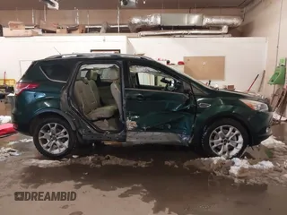 2014 Ford Escape Titanium with VIN 1FMCU9J93EUB95638, listed as a IAAI auction lot 41481089 with 182,258 mi miles. Bid and sale history available at carsss.com. Image 14.