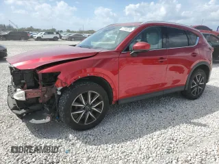 2018 Mazda CX-5 Grand Touring with VIN JM3KFADM7J0399895, listed as a Copart auction lot 47598265 with 0 mi miles and Salvage Title. Bid and sale history available at carsss.com. Image 1.