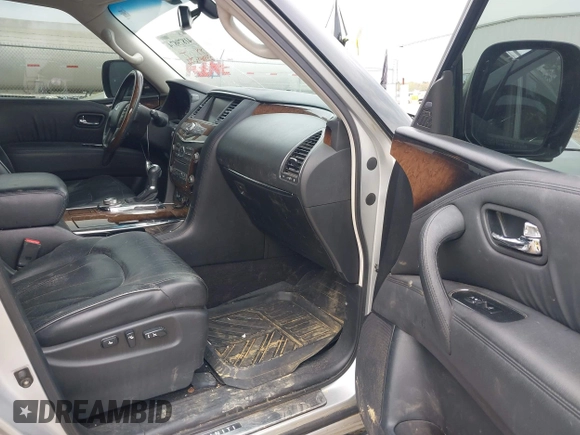 2012 Infiniti QX56 8-passenger with VIN JN8AZ2NC5C9317396, listed as a IAAI auction lot 41879874 with 233,064 mi miles. Bid and sale history available at carsss.com. Image 5.