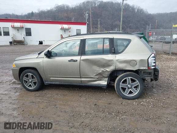 2008 Jeep Compass Sport with VIN 1J8FF47W08D728845, listed as a IAAI auction lot 41673205 with 70,333 mi miles. Bid and sale history available at carsss.com. Image 14.