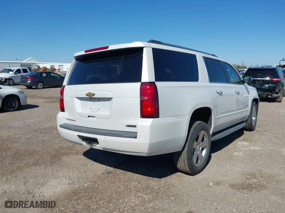 2017 Chevrolet Suburban Premier with VIN 1GNSCJKC7HR142082, listed as a IAAI auction lot 41749026 with 152,415 mi miles. Bid and sale history available at carsss.com. Image 4.