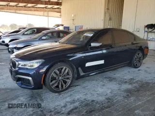 2019 BMW 7 Series M760i xDrive with VIN WBA7H6C55KG614986, listed as a Copart auction lot 84023164 with 59,222 mi miles and Non Repairable. Bid and sale history available at carsss.com. Image 1.
