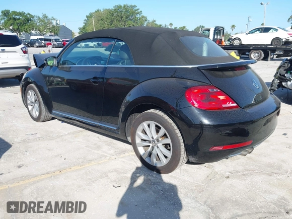 2015 Volkswagen Beetle with VIN 3VW5A7AT7FM811978, listed as a IAAI auction lot 41983986 with 84,421 mi miles and . Bid and sale history available at DreamBid. Image 3.