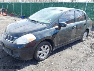 2007 Nissan Versa 1.8 S with VIN 3N1BC11E27L440690, listed as a IAAI auction lot 41832369 with 999,999 mi miles. Bid and sale history available at carsss.com. Image 2.
