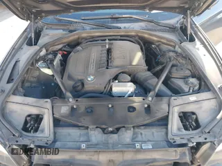 2015 BMW 5 Series 535i xDrive with VIN WBA5B3C58FD547704, listed as a IAAI auction lot 41764129 with 152,649 mi miles. Bid and sale history available at carsss.com. Image 10.
