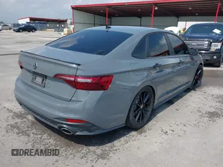 2024 Volkswagen Jetta GLI 40th Anniversary Edition with VIN 3VW9T7BUXRM021579, listed as a IAAI auction lot 42166630 with 24,690 mi miles and . Bid and sale history available at DreamBid. Image 4.