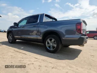 2023 Honda Ridgeline RTL z VIN 5FPYK3F5XPB025508, wystawiony jako Copart lot #64200695 z przebiegiem 3 913 mil mil oraz Szkoda całkowita • Salvage title. Historia ofert i sprzedaży dostępna na DreamBid. Obrazek 2.