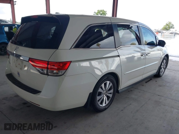 2015 Honda Odyssey EX-L with VIN 5FNRL5H64FB084175, listed as a IAAI auction lot 41943540 with 67,902 mi miles and . Bid and sale history available at carsss.com. Image 4.