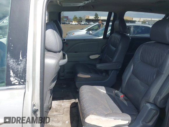 2005 Honda Odyssey EX-L with VIN 5FNRL38655B002926, listed as a IAAI auction lot 42137025 with 209,863 mi miles. Bid and sale history available at carsss.com. Image 8.
