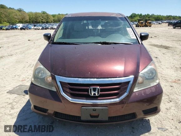 2010 Honda Odyssey LX z VIN 5FNRL3H25AB004652, wystawiony jako Copart lot #54923025 z przebiegiem 335 312 mil mil oraz Szkoda całkowita • Salvage title. Historia ofert i sprzedaży dostępna na DreamBid. Obrazek 5.