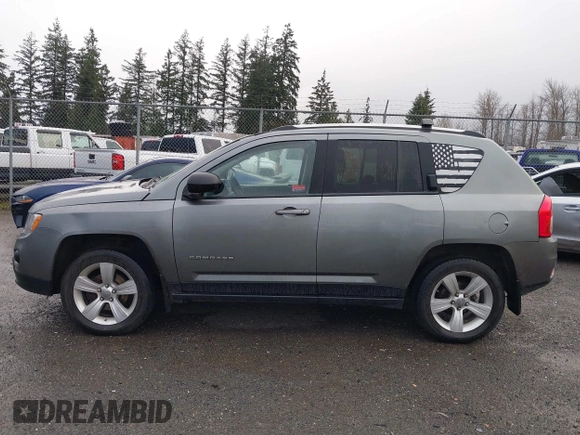 2013 Jeep Compass Sport with VIN 1C4NJDBB5DD101879, listed as a IAAI auction lot 41208112 with 168,300 mi miles. Bid and sale history available at carsss.com. Image 14.