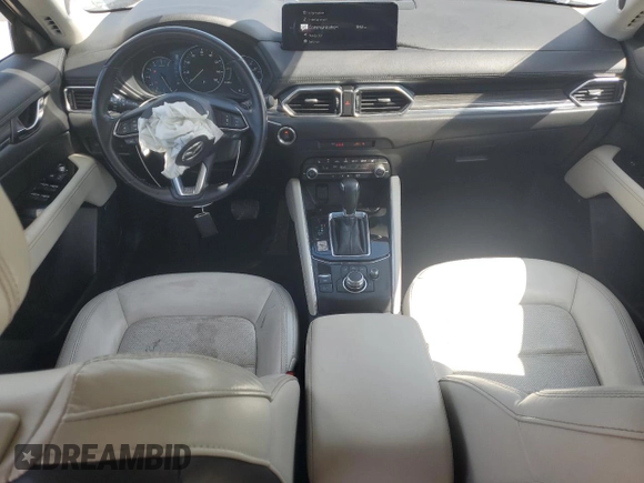 2021 Mazda CX-5 Grand Touring with VIN JM3KFADM1M0301366, listed as a Copart auction lot 52890955 with 66,686 mi miles and Non Repairable. Bid and sale history available at carsss.com. Image 8.