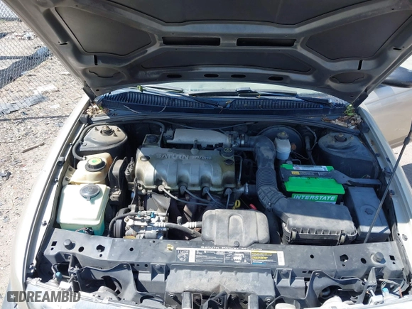 1996 Saturn SL with VIN 1G8ZH5288TZ230864, listed as a IAAI auction lot 42116703 with 104,387 mi miles. Bid and sale history available at carsss.com. Image 10.
