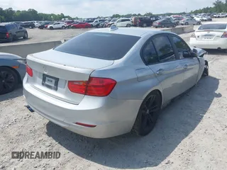 2013 BMW 3 Series 328i with VIN WBA3A5C54DF601944, listed as a IAAI auction lot 42430888 with 137,843 mi miles and . Bid and sale history available at DreamBid. Image 4.