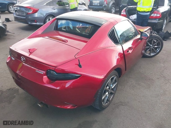 2023 Mazda MX-5 Miata RF Grand Touring with VIN JM1NDAM78P0551083, listed as a IAAI auction lot 41229002 with 10,152 mi miles. Bid and sale history available at carsss.com. Image 4.