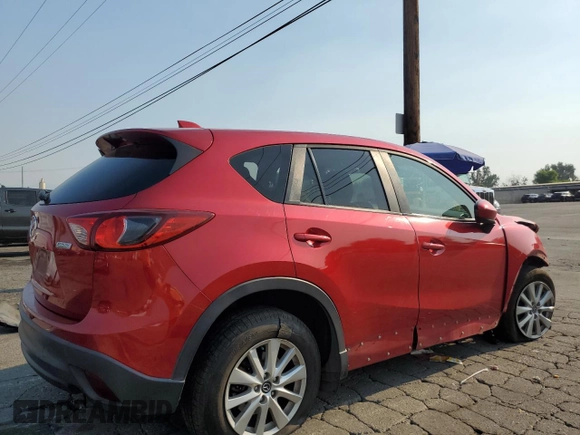 2014 Mazda CX-5 Touring with VIN JM3KE2CY0E0309845, listed as a Copart auction lot 62193734 with 97,878 mi miles and Salvage Title. Bid and sale history available at carsss.com. Image 3.