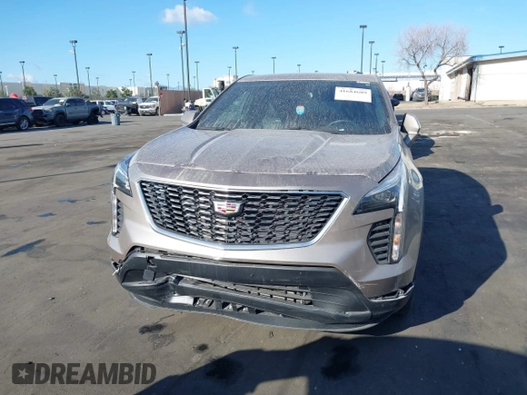 2023 Cadillac XT4 FWD Luxury z VIN 1GYAZAR40PF135132, wystawiony jako IAAI lot #41684609 z przebiegiem 12 164 mil mil oraz . Historia ofert i sprzedaży dostępna na DreamBid. Obrazek 13.