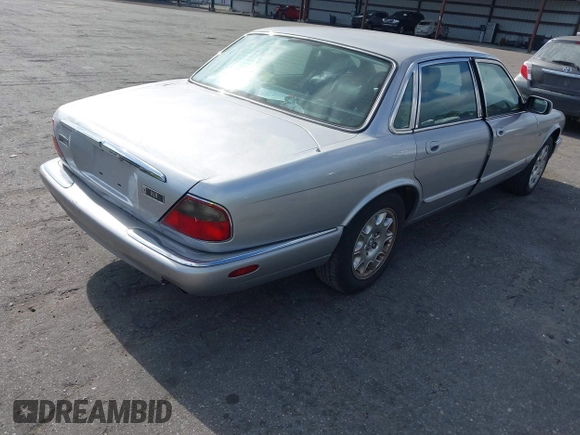 2000 Jaguar XJ with VIN SAJDA14C4YLF13470, listed as a IAAI auction lot 42136313 with 237,063 mi miles and . Bid and sale history available at DreamBid. Image 4.