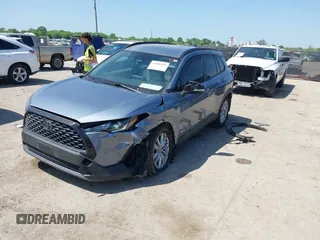 2023 Toyota Corolla Cross LE with VIN 7MUCAAAGXPV045651, listed as a IAAI auction lot 42006289 with 23,282 mi miles and . Bid and sale history available at DreamBid. Image 17.