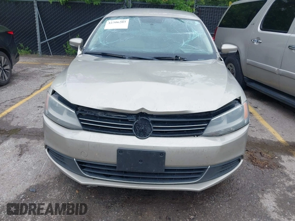 2013 Volkswagen Jetta SE z VIN 3VWDX7AJ2DM255858, wystawiony jako IAAI lot #42306203 z przebiegiem 221 309 mil mil oraz . Historia ofert i sprzedaży dostępna na DreamBid. Obrazek 6.