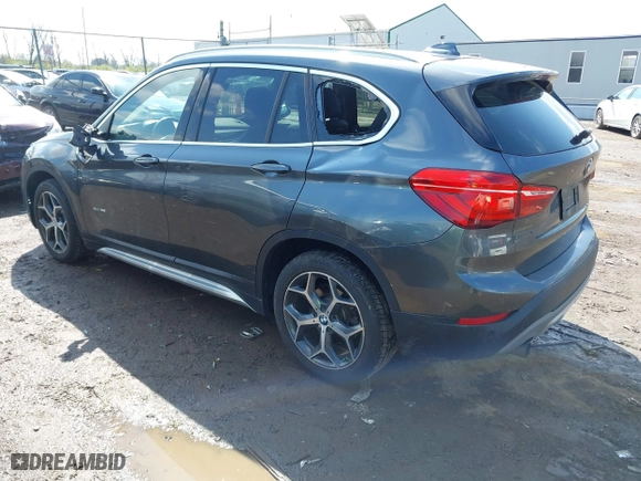 2016 BMW X1 xDrive28i with VIN WBXHT3C35GP886094, listed as a IAAI auction lot 42009639 with 61,739 mi miles. Bid and sale history available at carsss.com. Image 3.