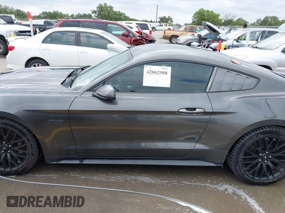 2016 Ford Mustang GT with VIN 1FA6P8CF8G5215553, listed as a IAAI auction lot 42062988 with 71,314 mi miles and . Bid and sale history available at DreamBid. Image 14.