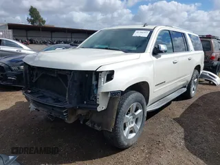 2015 Chevrolet Suburban LTZ with VIN 1GNSKKKC5FR127201, listed as a IAAI auction lot 41706562 with 151,644 mi miles and . Bid and sale history available at DreamBid. Image 18.