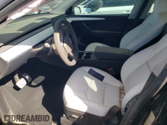 2023 Tesla Model Y Performance with VIN 7SAYGDEF3PF773031, listed as a Copart auction lot 47105765 with 25,604 mi miles and Salvage Title. Bid and sale history available at DreamBid. Image 7.