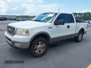 2005 Ford F-150 XLT with VIN 1FTRX12595KC66016, listed as a IAAI auction lot 42485204 with 279,386 mi miles and . Bid and sale history available at DreamBid. Image 2.