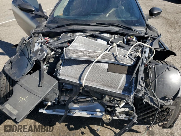 2018 Aston Martin DB11 z VIN SCFRMFAV1JGL05008, wystawiony jako Copart lot #77024394 z przebiegiem Nie podano mil oraz Szkody całkowita. Historia ofert i sprzedaży dostępna na DreamBid. Obrazek 11.