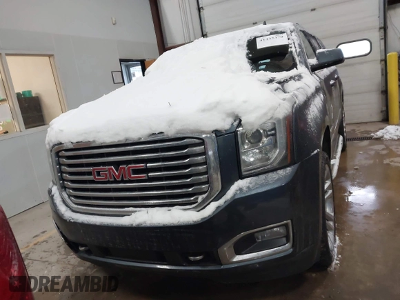 2019 GMC Yukon XL SLT with VIN 1GKS2GKC5KR137005, listed as a IAAI auction lot 41435370 with 125,453 mi miles and . Bid and sale history available at carsss.com. Image 11.