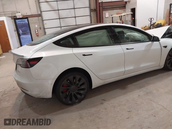 2021 Tesla Model 3 Performance with VIN 5YJ3E1ECXMF991836, listed as a IAAI auction lot 41830519 with Not Provided miles and . Bid and sale history available at carsss.com. Image 4.