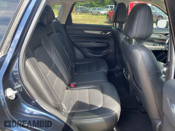 2018 Mazda CX-5 Grand Touring with VIN JM3KFBDMXJ1391984, listed as a Copart auction lot 65138665 with 97,244 mi miles and Clean title. Bid and sale history available at DreamBid. Image 6.