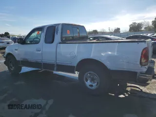 1997 Ford F-150 XL с VIN 1FTEX17L9VKB65855, выставлен на аукционе Copart как лот 87410414 с пробегом 198 005 миль миль и Списание • Salvage title. История ставок и продаж доступна на DreamBid. Изображение 2.