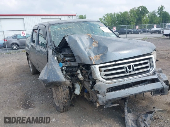 2013 Honda Ridgeline RTL with VIN 5FPYK1F56DB004834, listed as a IAAI auction lot 42706361 with 230,000 mi miles and . Bid and sale history available at DreamBid. Image 6.