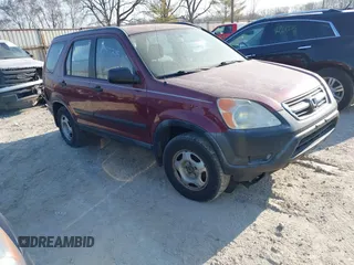 2003 Honda CR-V LX with VIN JHLRD68523C016012, listed as a IAAI auction lot 41797215 with 219,821 mi miles and . Bid and sale history available at carsss.com. Image 1.