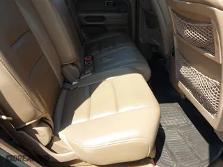 2007 Honda Pilot EX-L with VIN 2HKYF18537H502361, listed as a IAAI auction lot 42039836 with 167,431 mi miles. Bid and sale history available at carsss.com. Image 8.