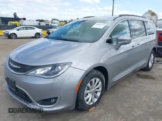 2017 Chrysler Pacifica Touring L with VIN 2C4RC1BG1HR803027, listed as a IAAI auction lot 41896775 with 112,896 mi miles and . Bid and sale history available at DreamBid. Image 2.